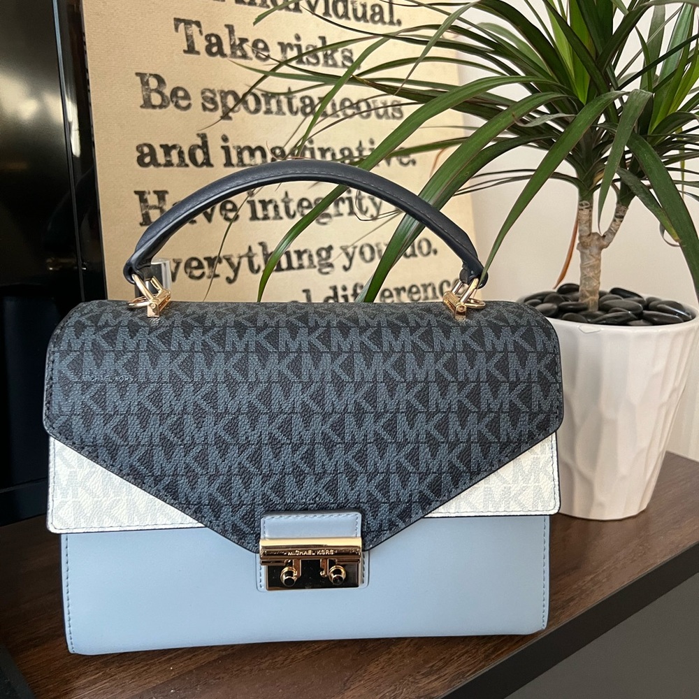 Blue Michael Kors Sloan tri-color clutch.